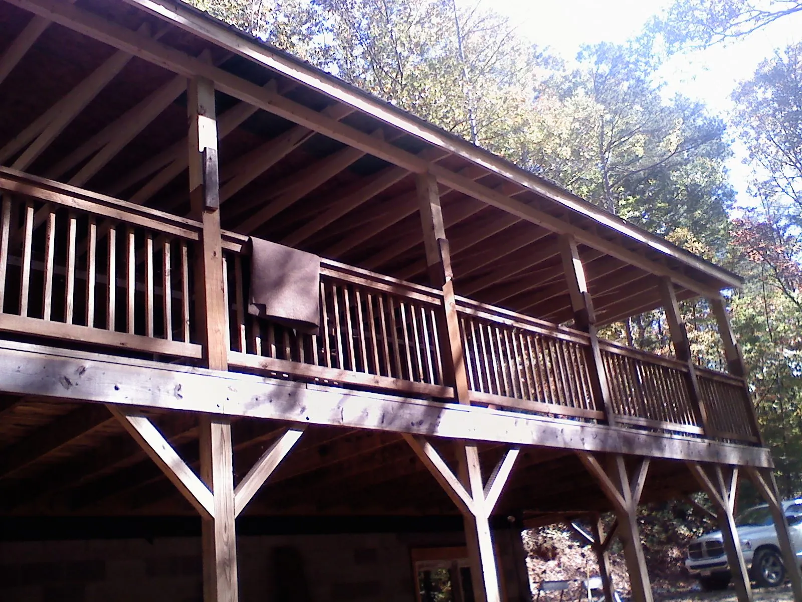 Timber framing under a new elevated porch and deck — Roof Leak Repair in Tate by Roofing Brothers